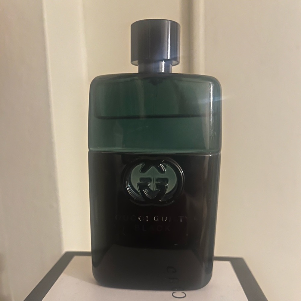 Gucci Guilty Cologne. Used but over half the bottle is still in there.